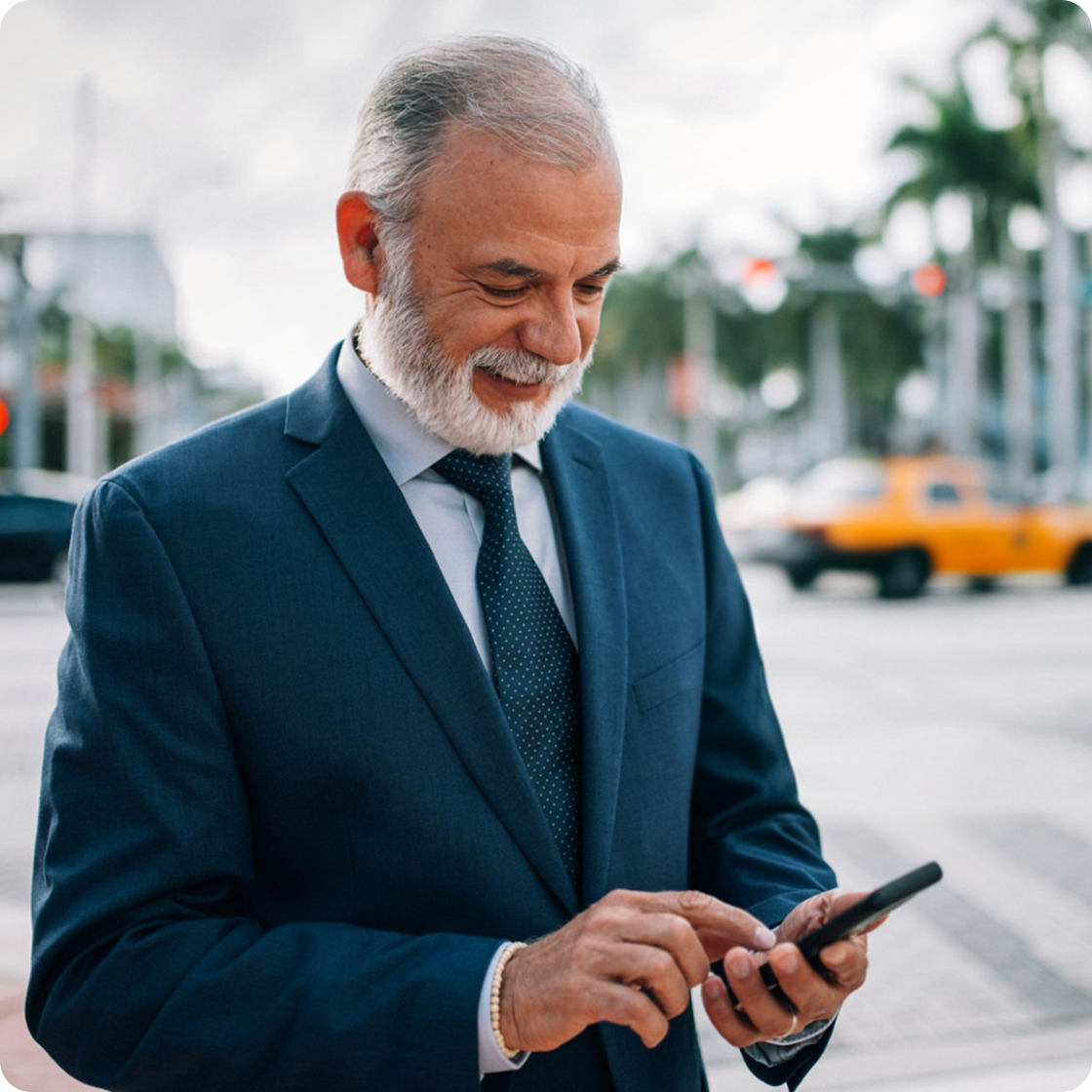 senior-lawyer-happily-checking-phone-at-a-court